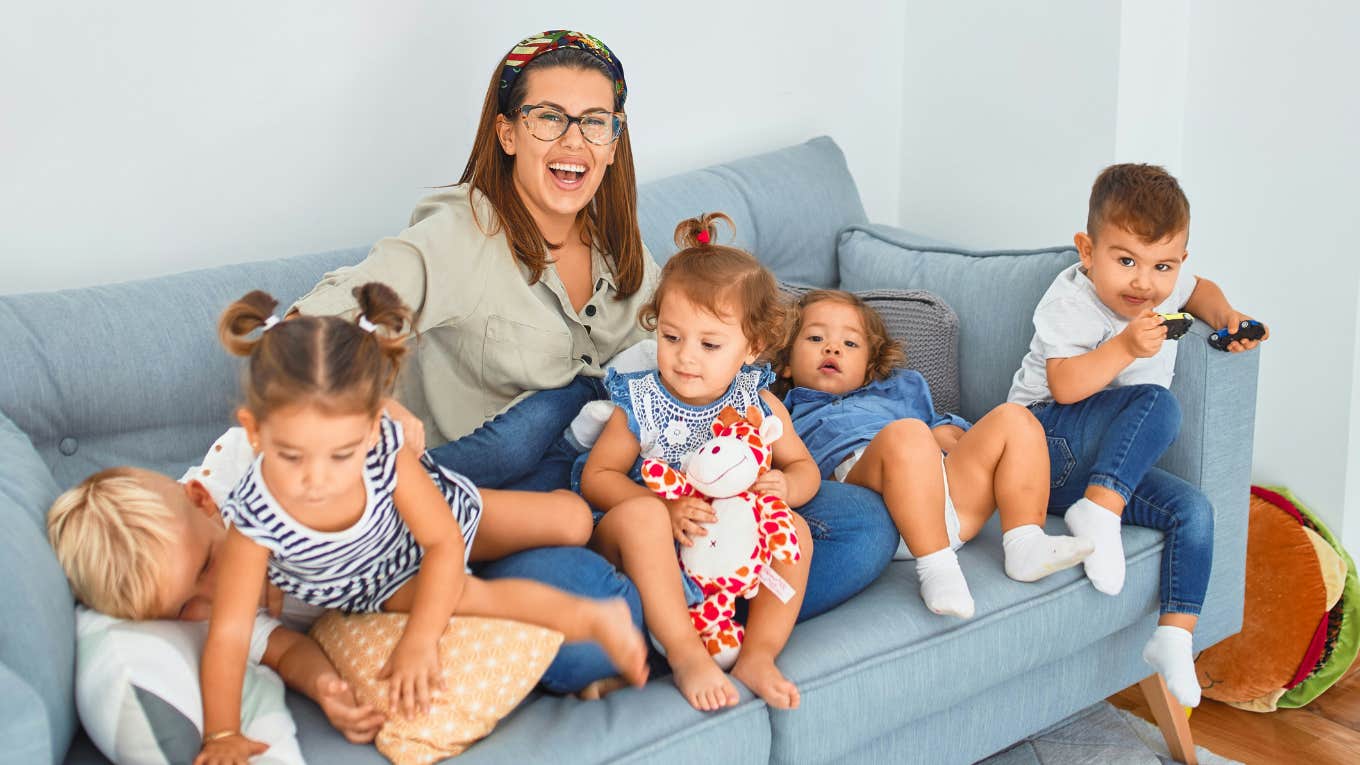 woman with kids on the couch
