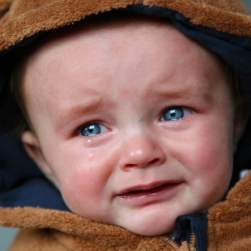 dad ignores neighbor complaints when his baby cries at night