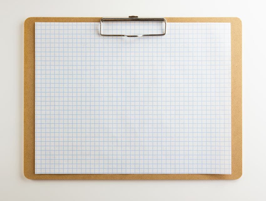 graph paper on a clipboard