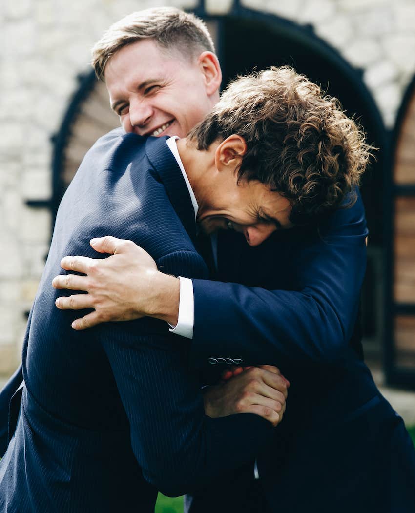 Two men enthusiastically hug to get what they need their relationship
