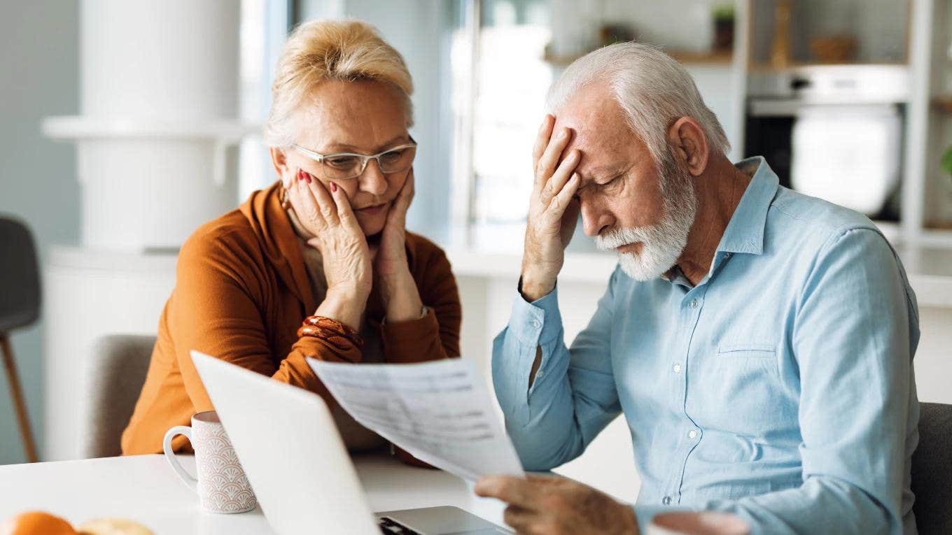elderly couple struggling over a budget