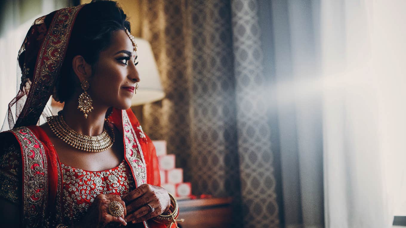 south asian bride during hindu wedding ceremony