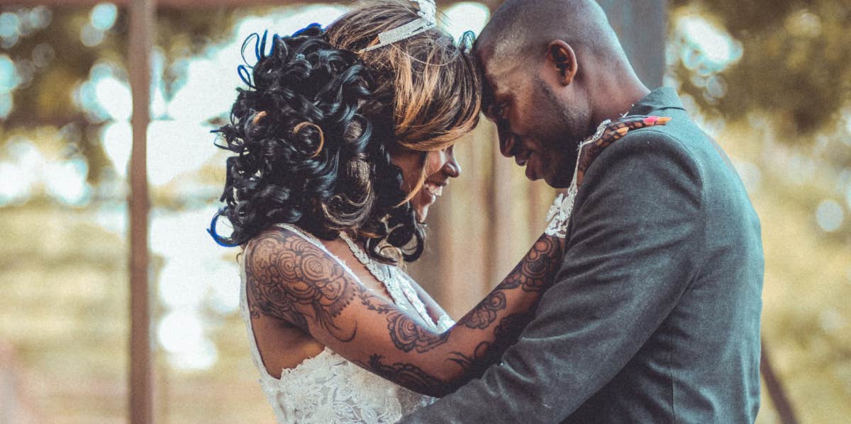 tattooed bride with groom 