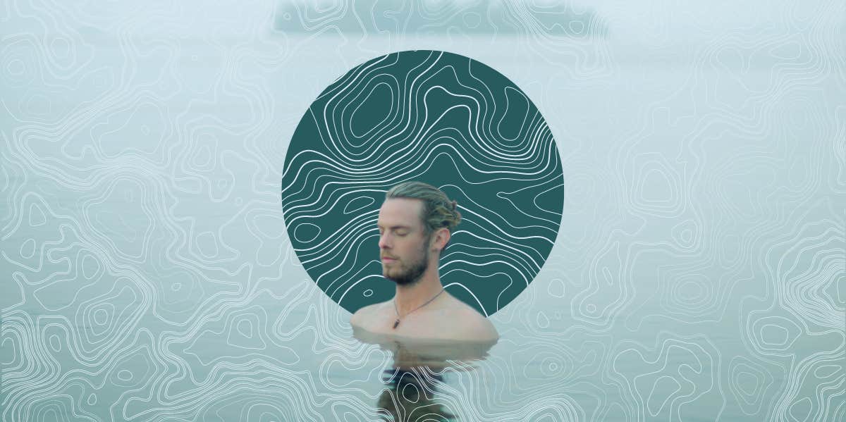 man meditating in the water
