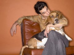 Man sitting with dog