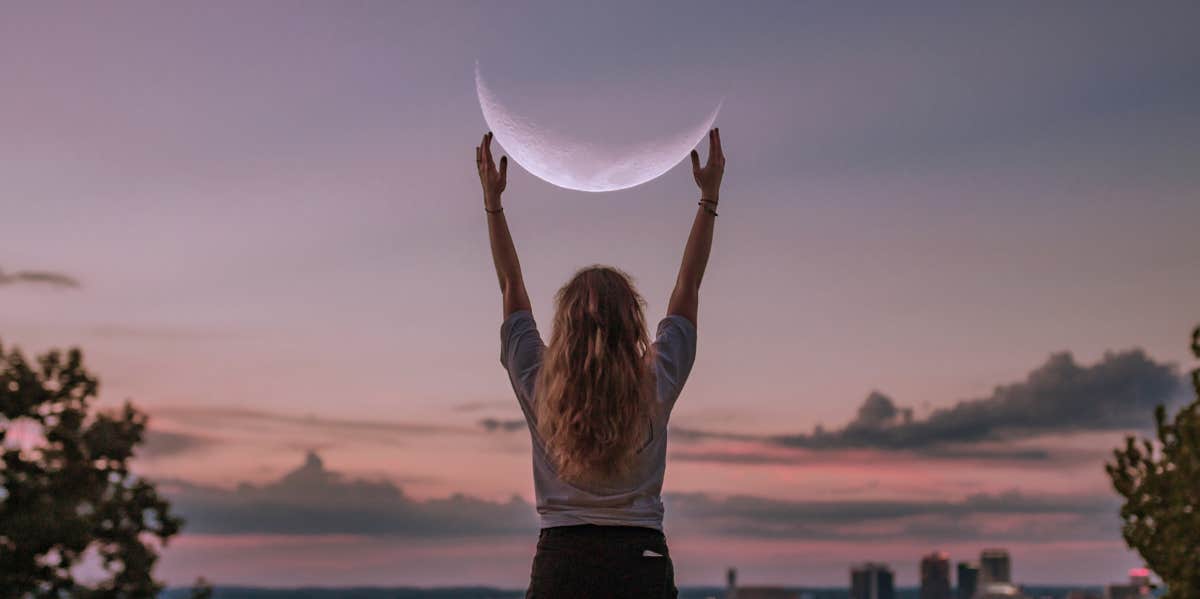 woman manifesting with the moon