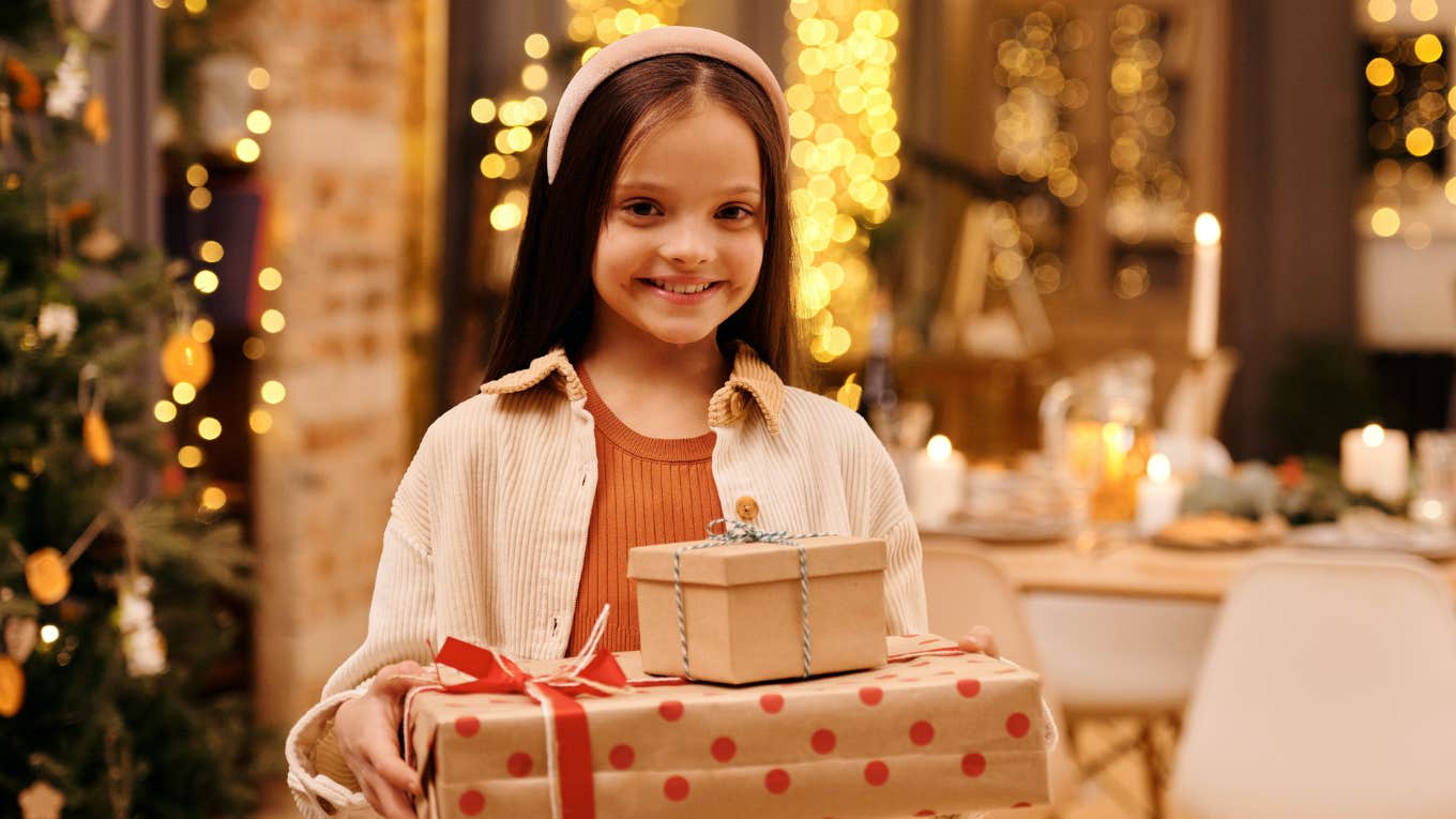 girl holding presents