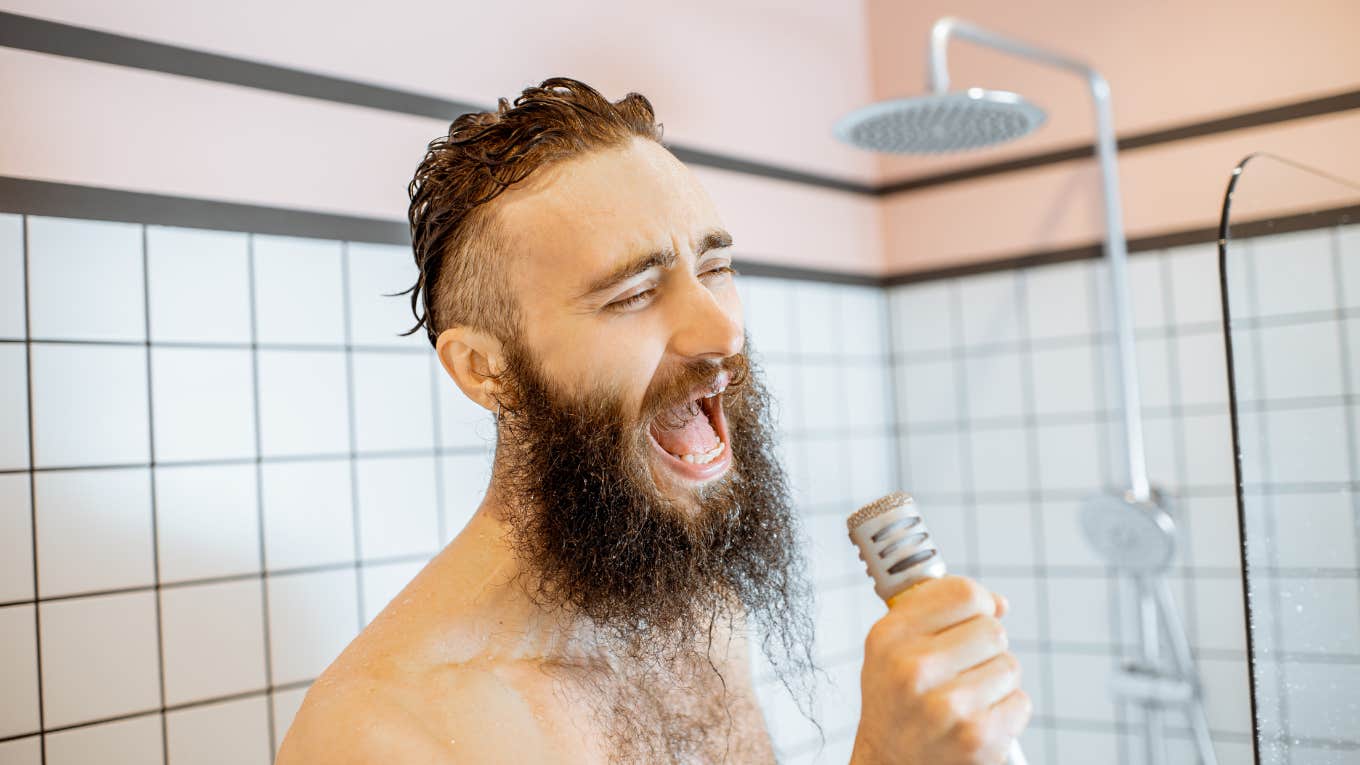 man singing in the shower