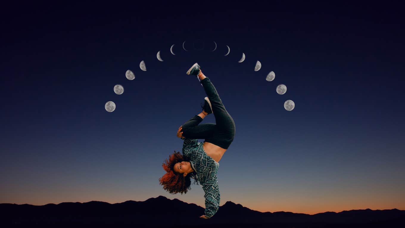 woman doing a handstand beneath the moon phases