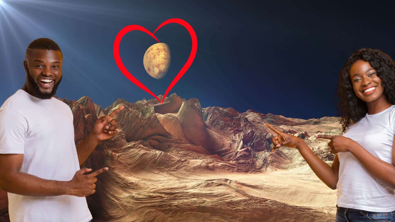 man and woman in space pointing to heart and mars