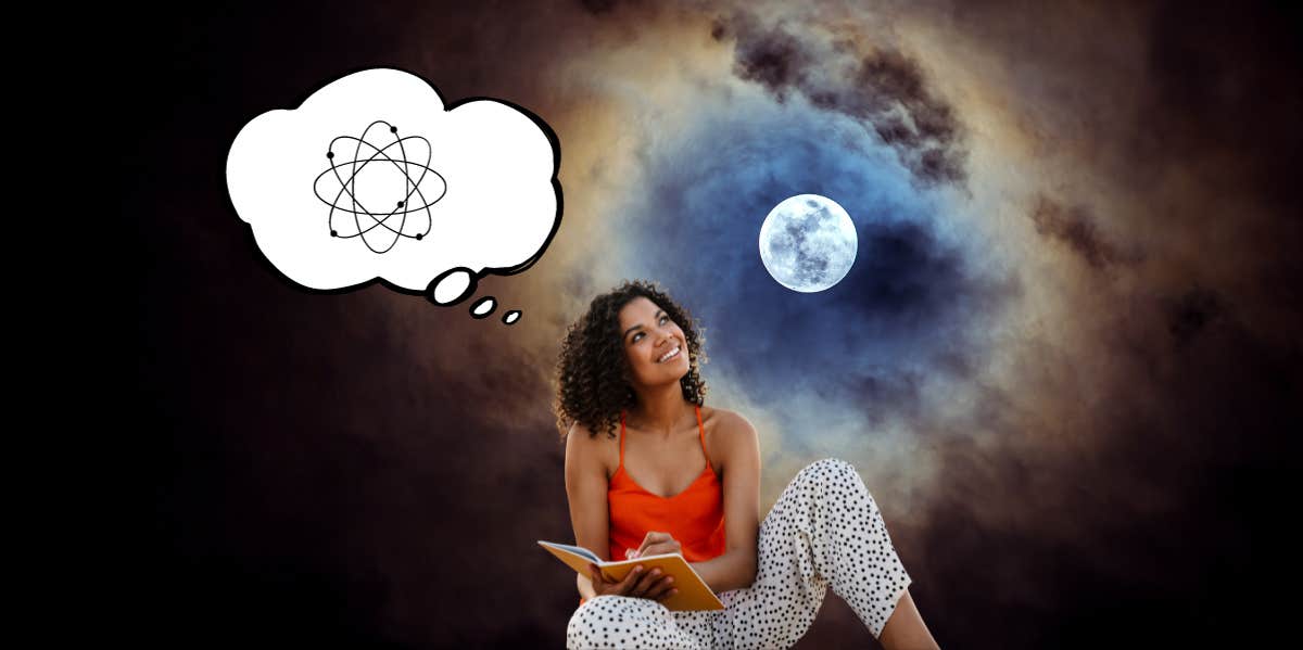 woman manifesting with full moon and journal