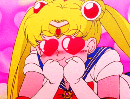 Serena of Sailor Moon with hearts in her eyes to represent falling madly in love