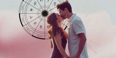 couple kissing and zodiac wheel