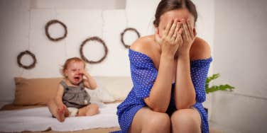 mom overwhelmed after snapping at her baby