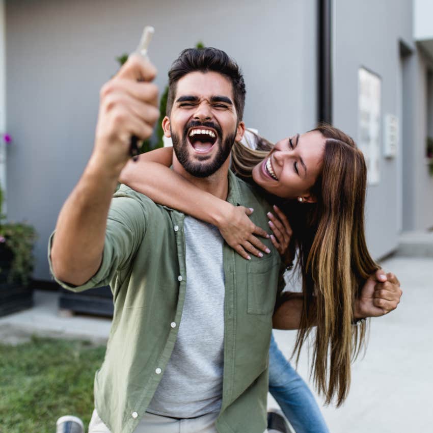 happy couple after buying home together