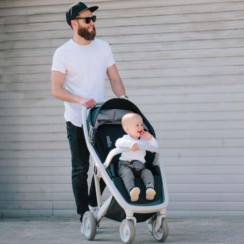 dad pushing baby in a stroller