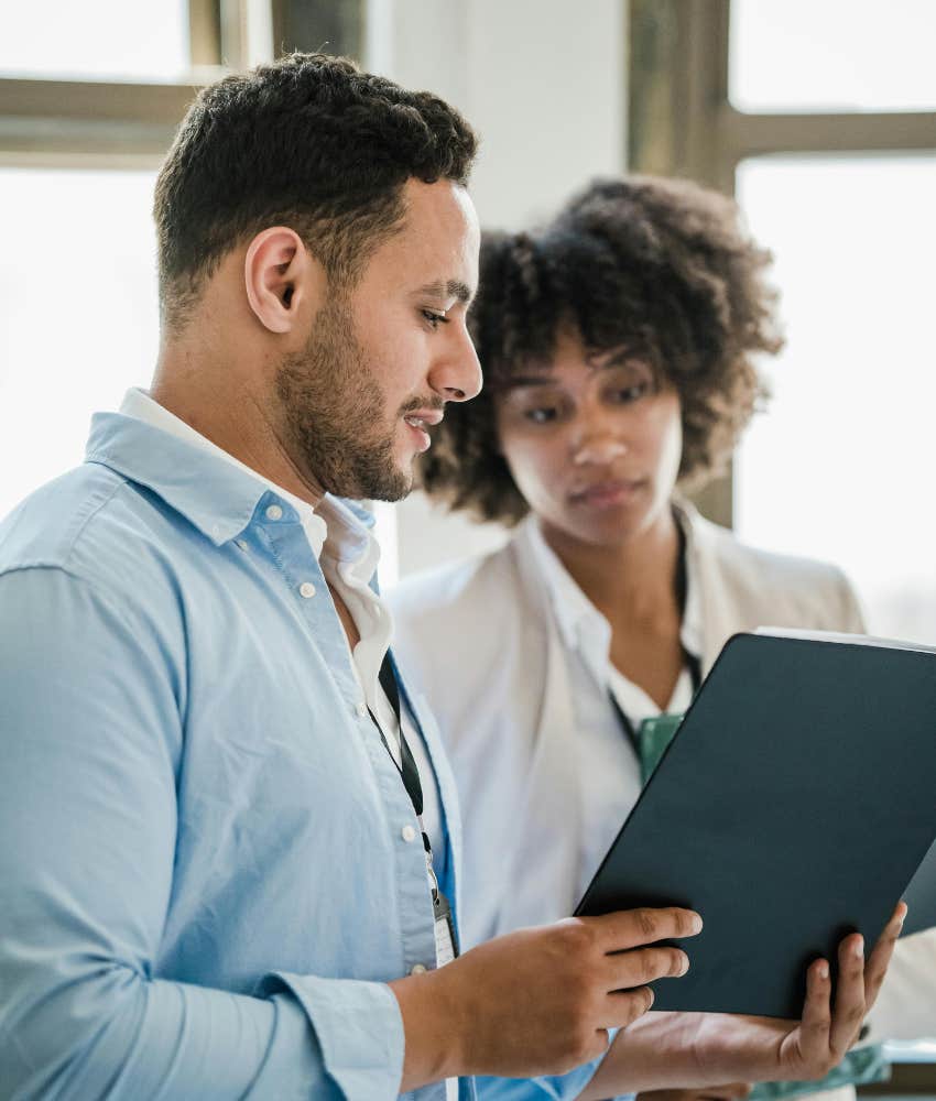 male and female coworker talking