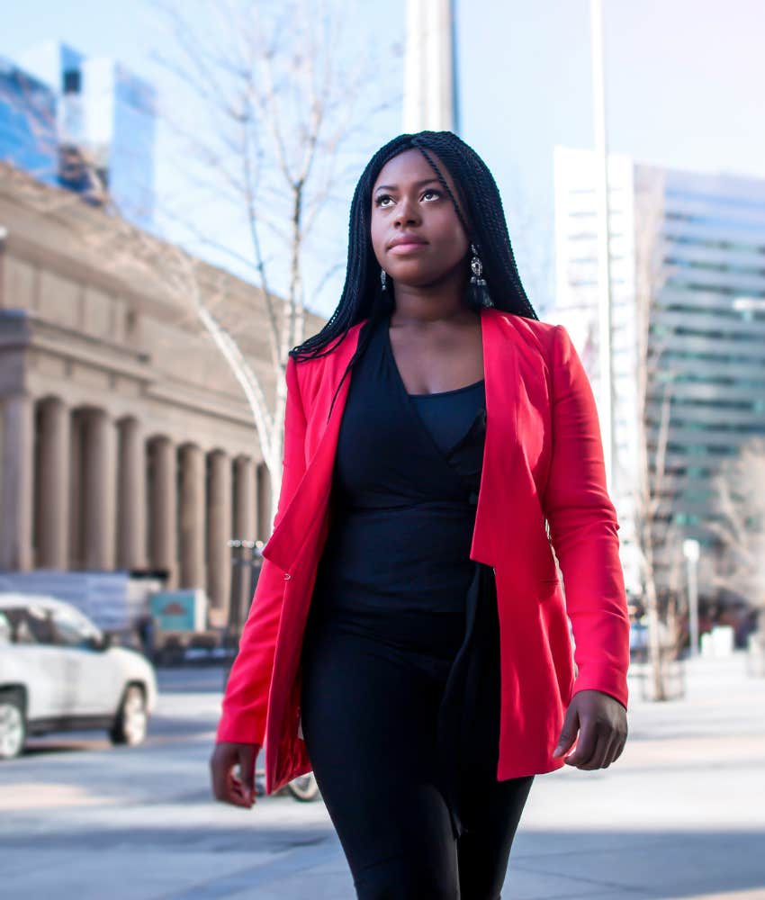 woman walking wearing blazer