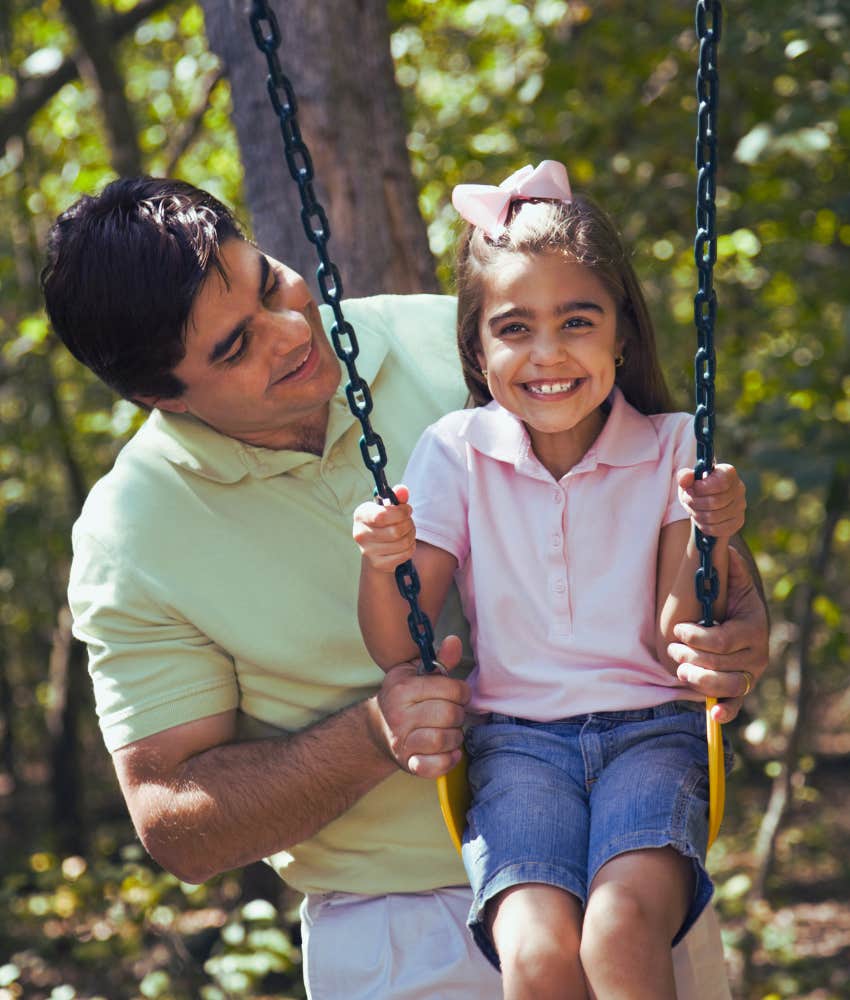 father and daughter spending time together at park