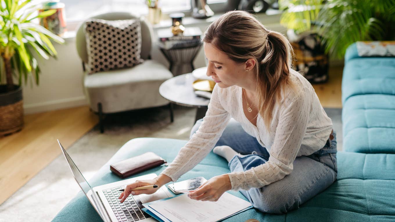 woman on laptop making a budget