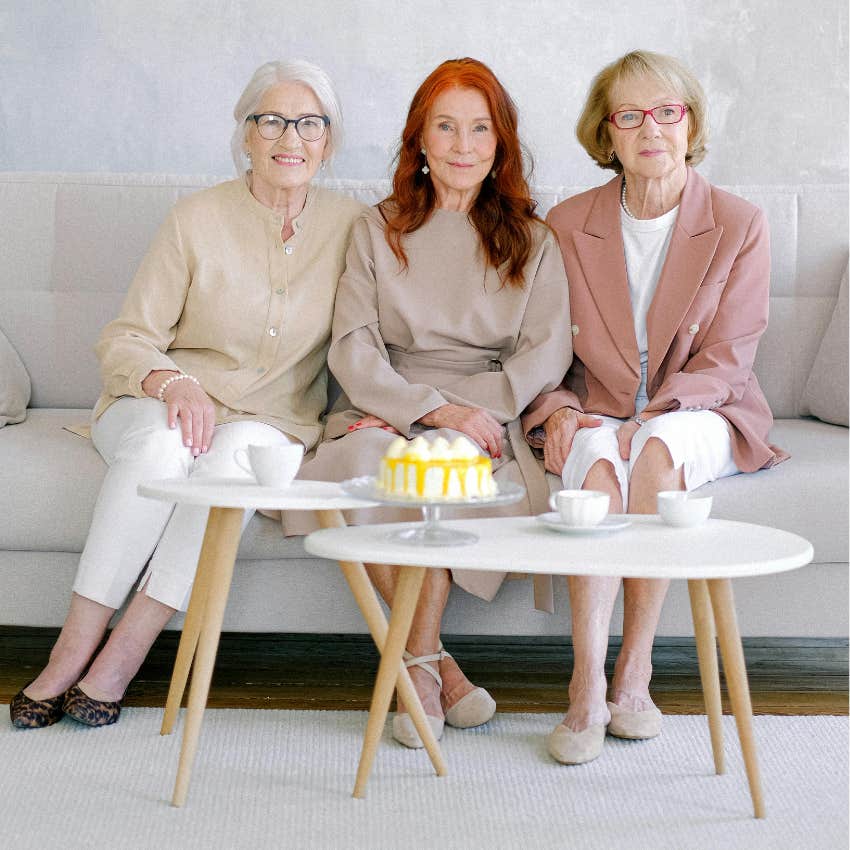 three older female friends sitting together