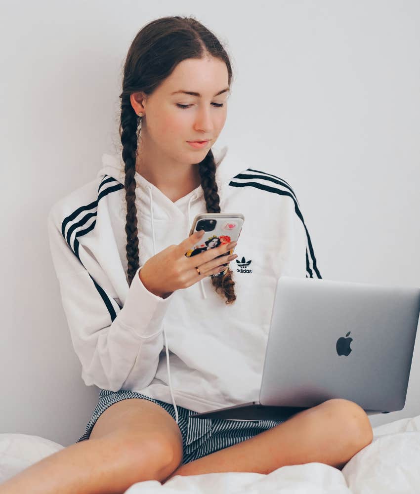 teen girl on phone and laptop