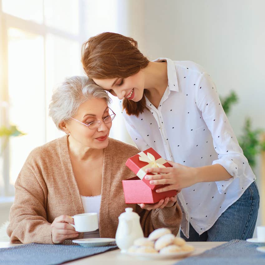 woman giving her mom a gift