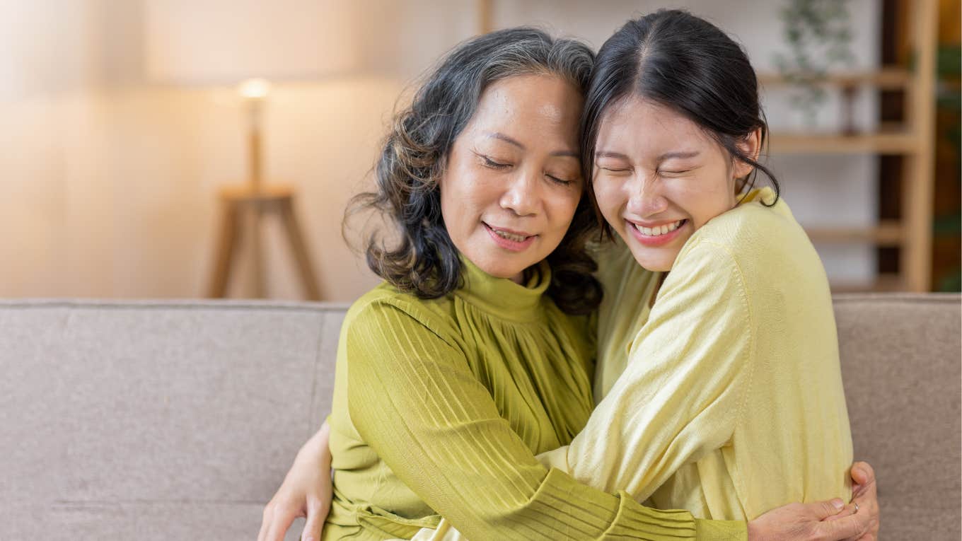 mom and daughter hugging