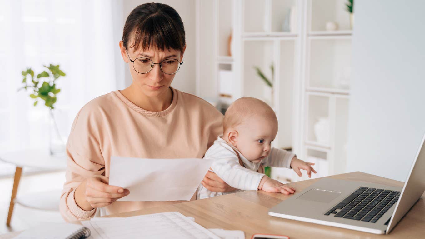 Stressed mom looking at finances