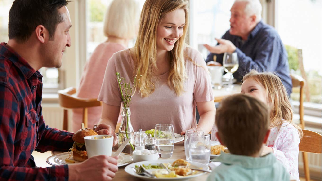 a family enjoys meal together at restaurant