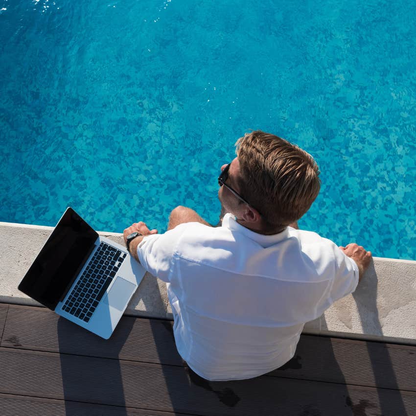 Remote worker quiet vacationing by the pool.