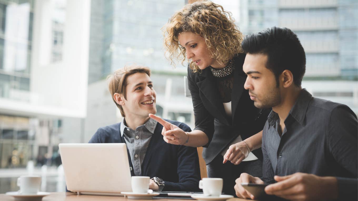 Co-workers having a meeting with their boss. 