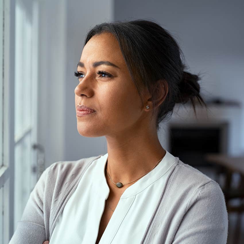 Woman looking out the window. 