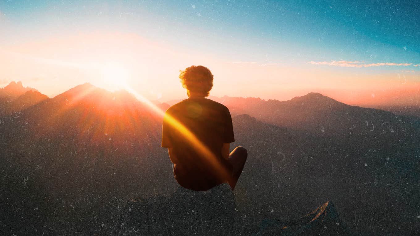 Man taking in sunset, calming his mind