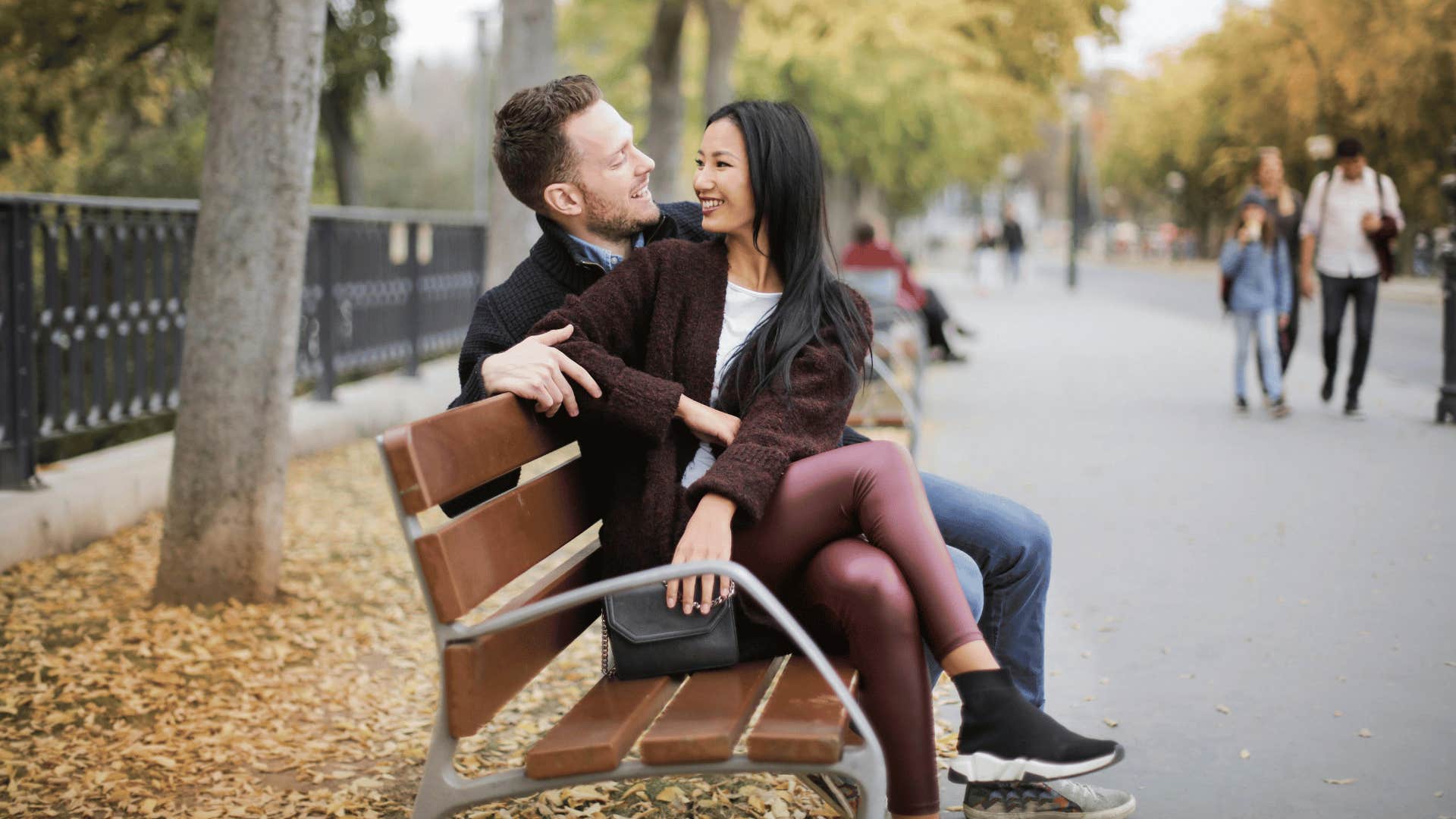 couple sitting together on a bench