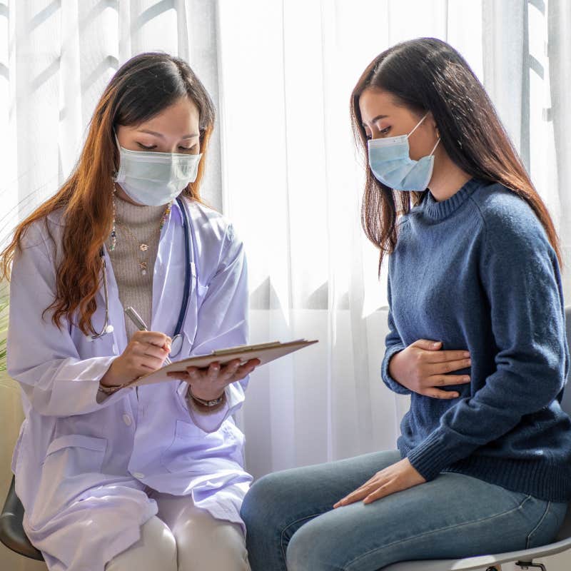 doctor examining patient