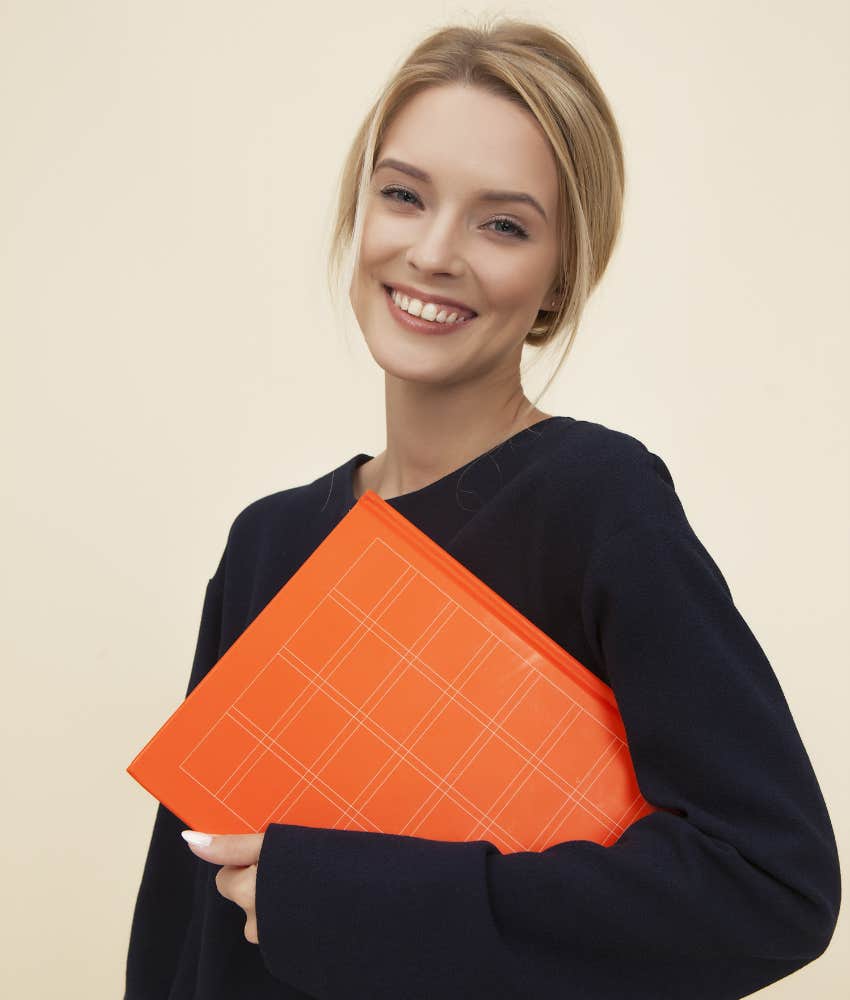 woman holding a folder