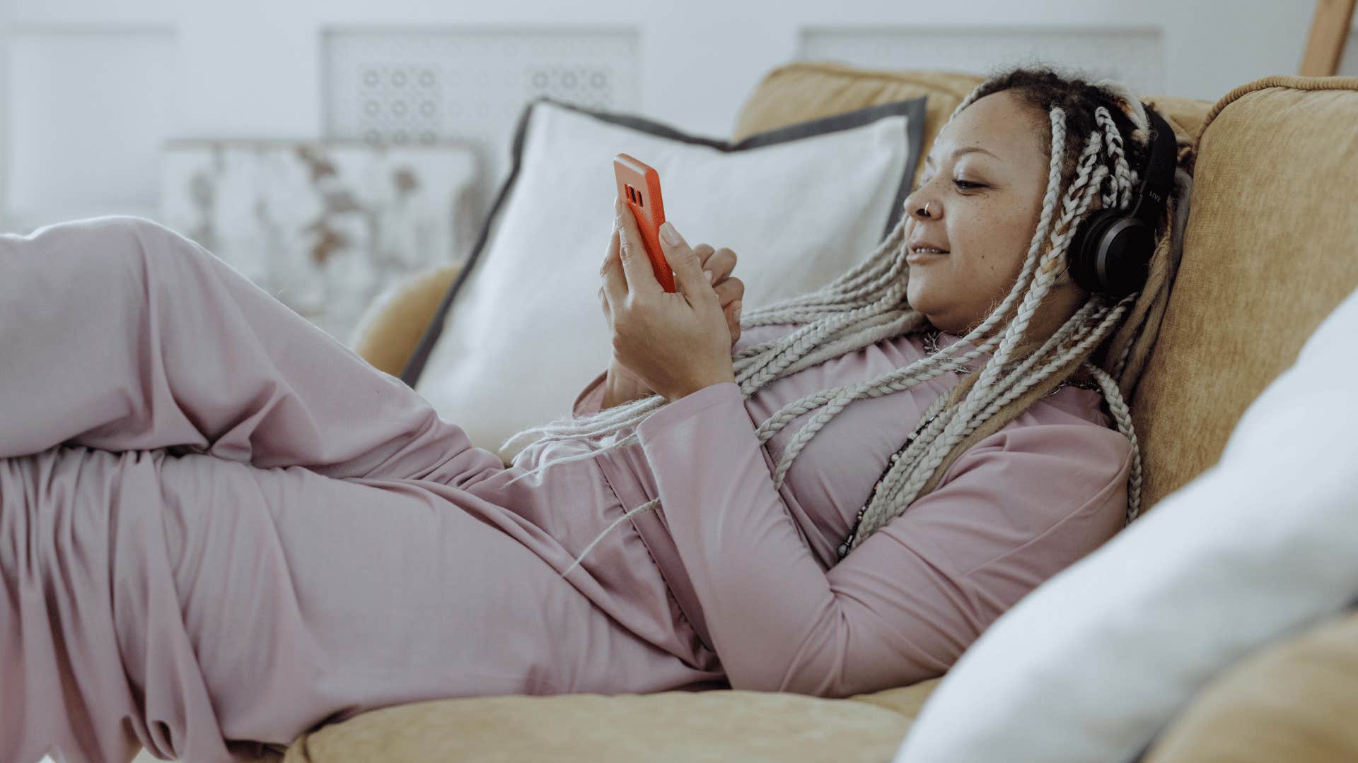 successful woman relaxing on couch