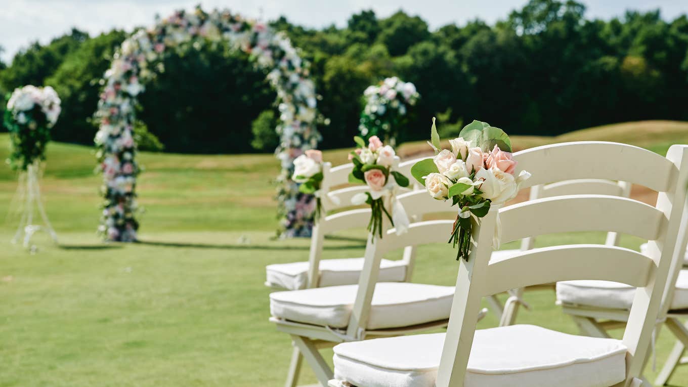 empty chairs at a wedding ceremony set up