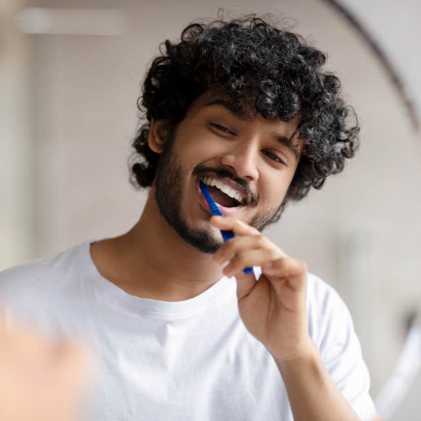 Man brushing his teeth