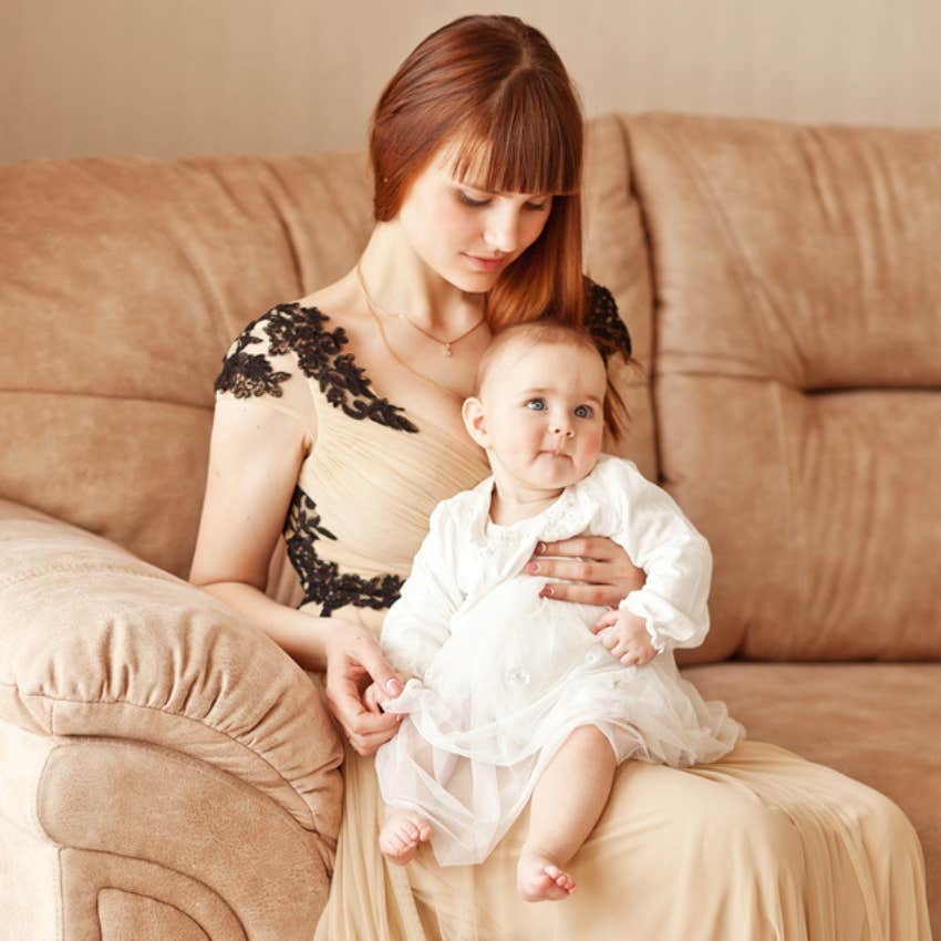 mom and infant in formal dress 