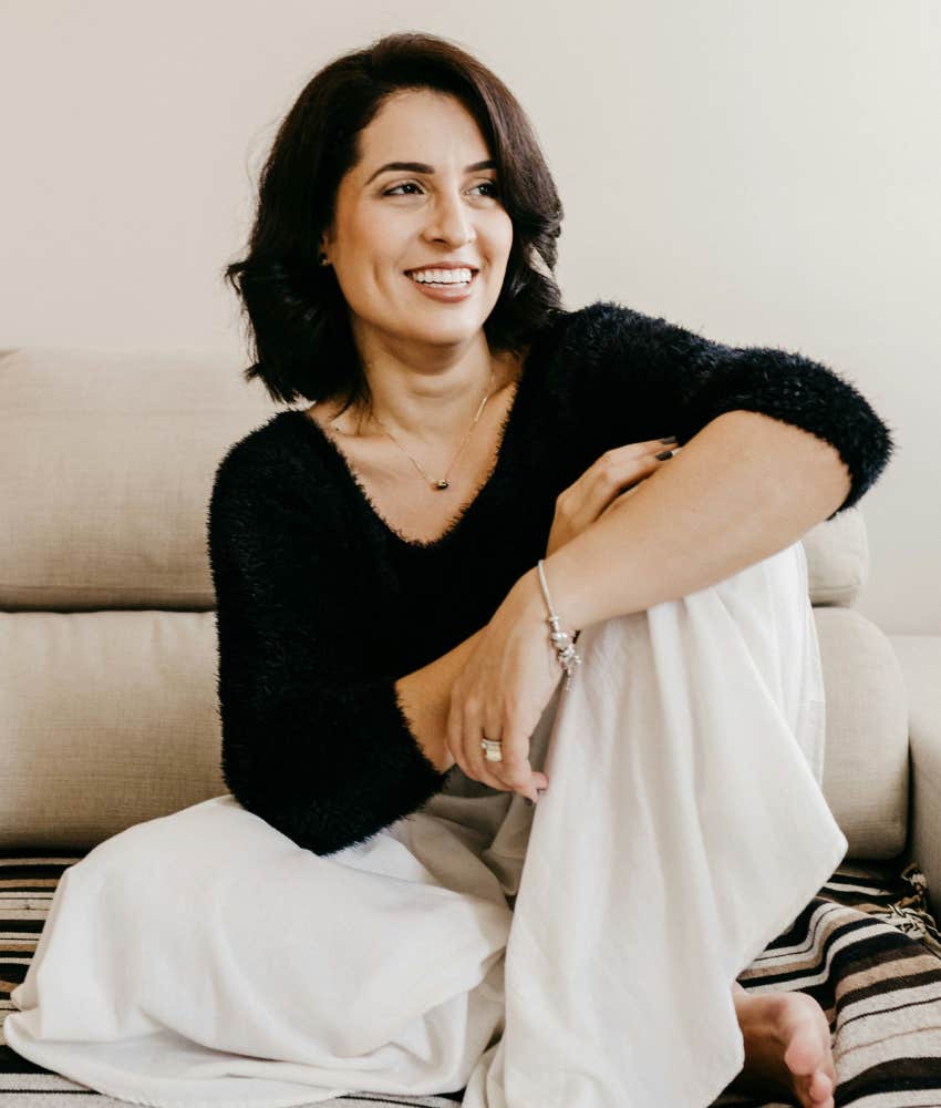 woman sitting on couch 