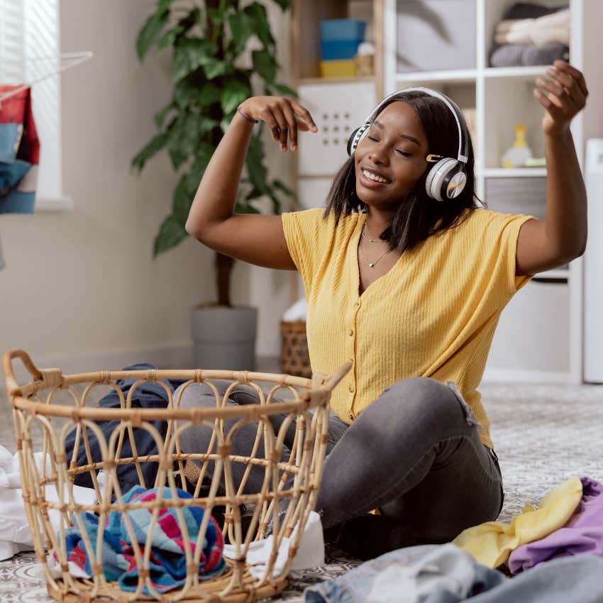 woman folding laundry 