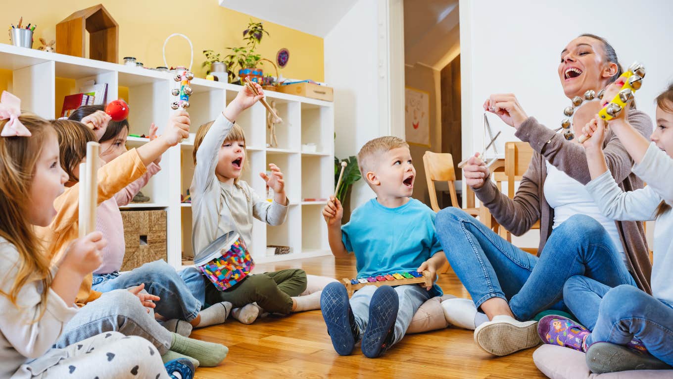 kids at daycare with teacher