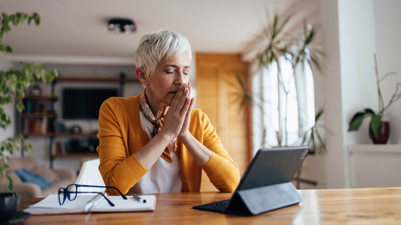 woman tries to release negative emotions from energy