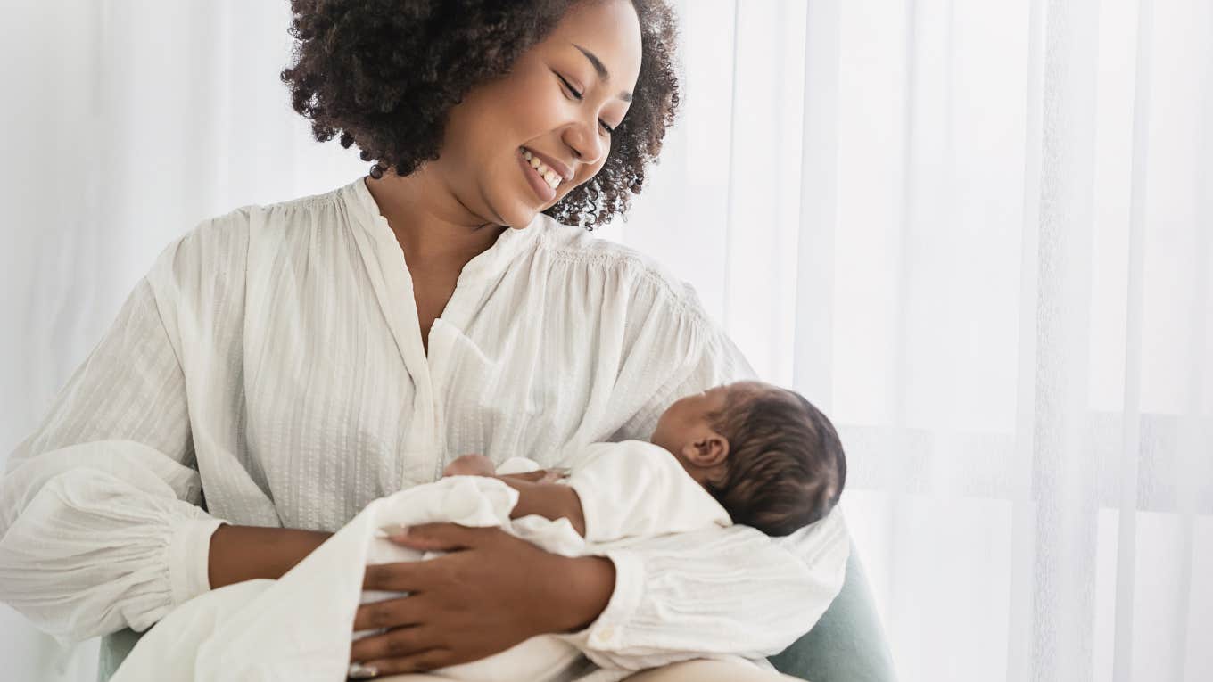 mom holding a newborn baby