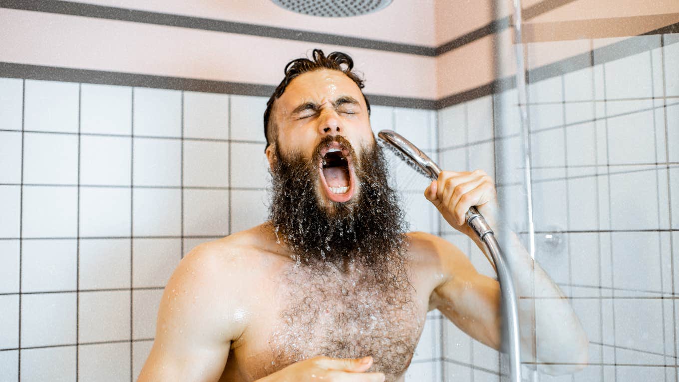 Kind, funny, dad bod man with beard singing in shower. Attractive to women 