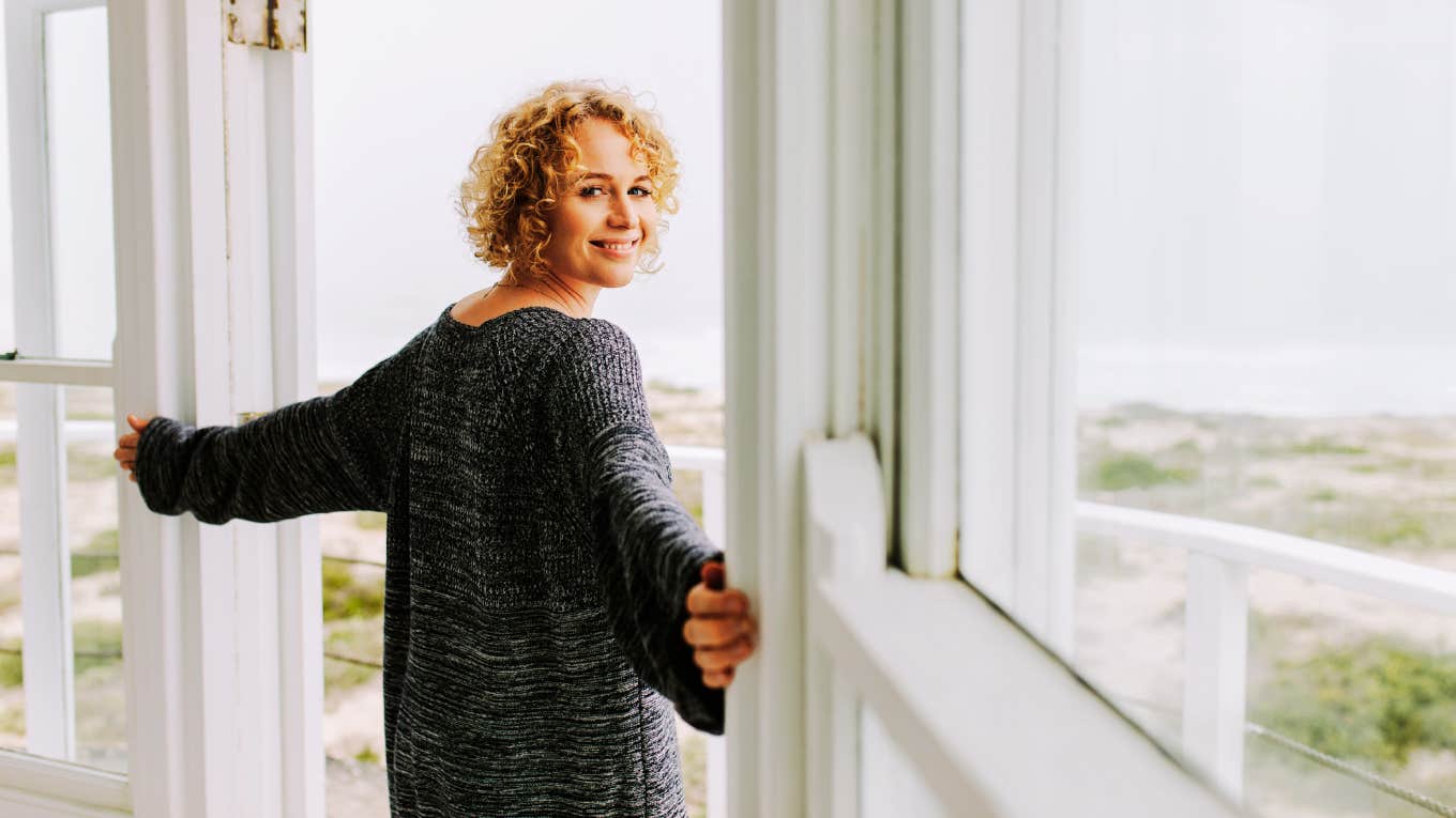 Thankful woman embracing her new freedom, after husband left her for another woman