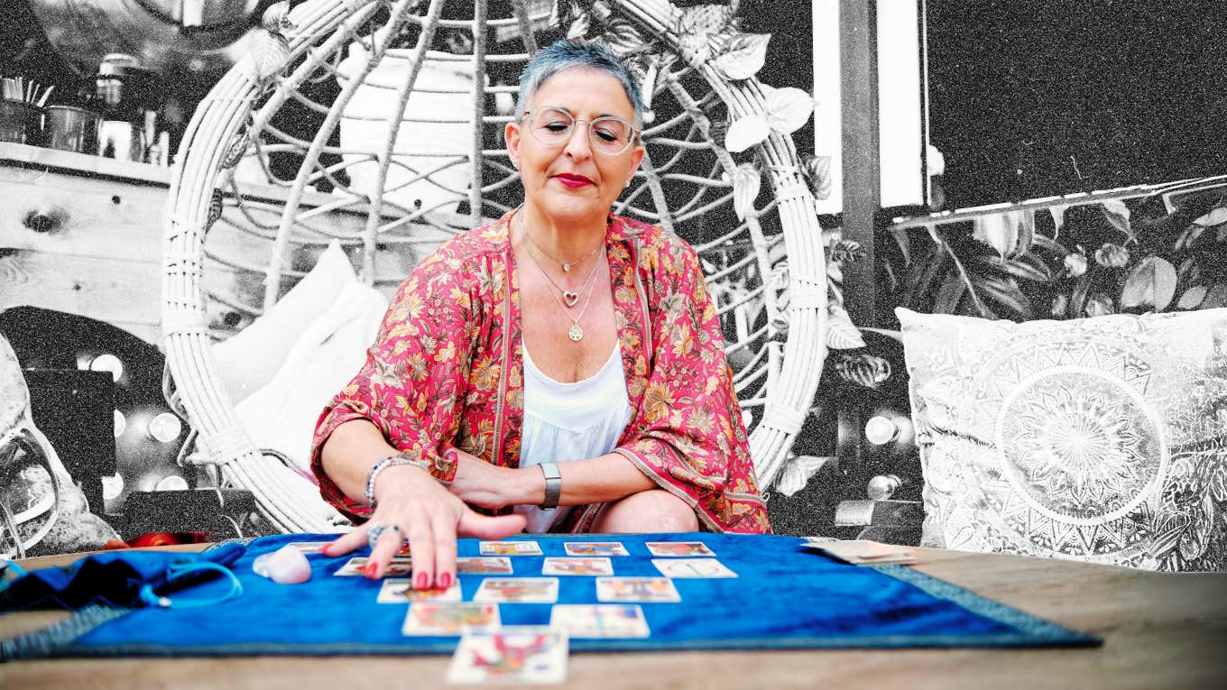 Woman teaching how to read tarot cards