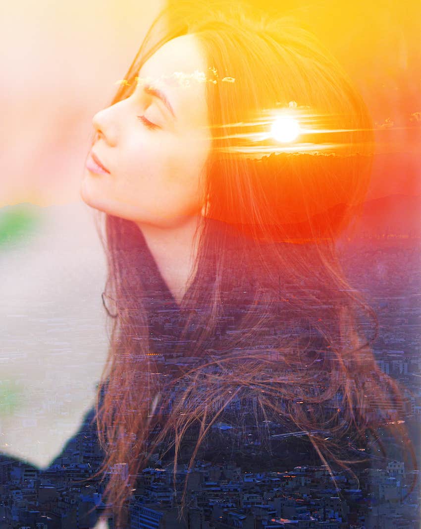 Double exposure of calm woman and sun she is not staying stuck